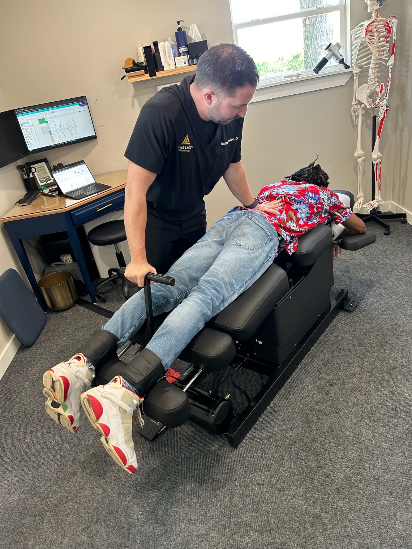 Spinal adjustment therapy